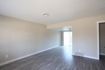 Image of large room with vinyl plank flooring